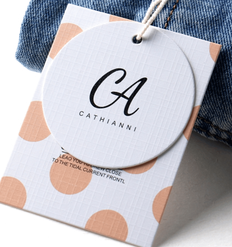 Hang Tags:Custom hang tags enhancing product presentation, printed with your brand details and premium finishing