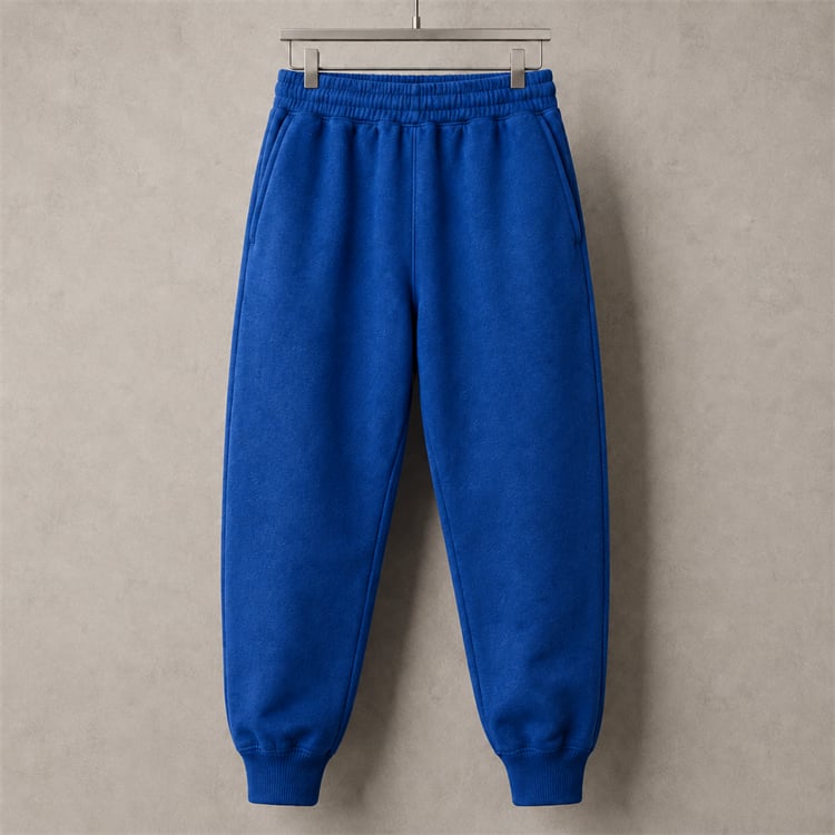 Cobalt blue heavyweight jogger sweatpants with a relaxed tapered fit