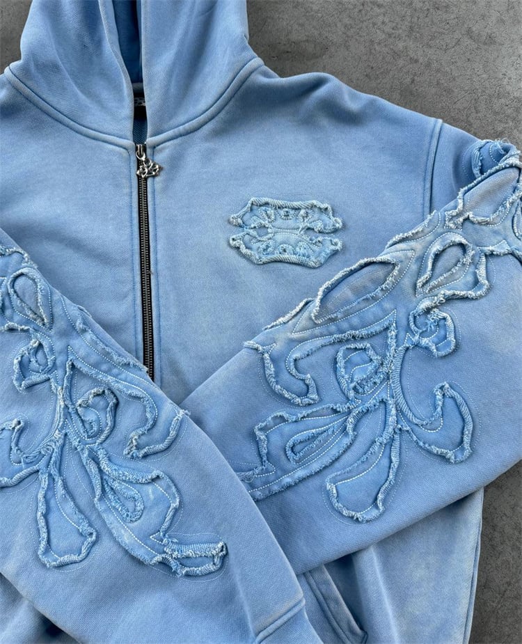 Custom streetwear garment details including embroidery zipper and premium stitching